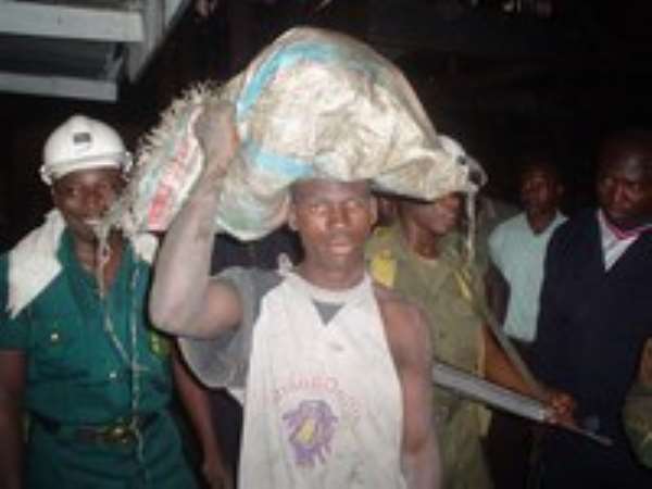 POLICE CHASE MINERS IN PIT